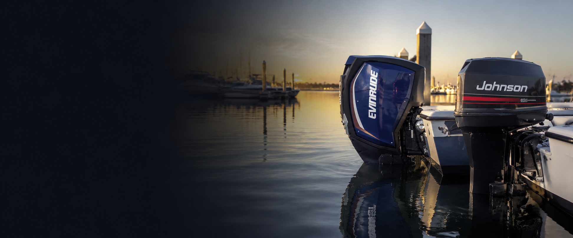Evinrude and Johnson outboard engines mounted on boats at a marina